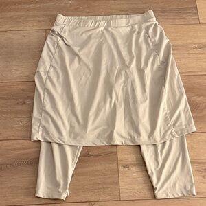 Elegant Cream Midi Skirt with Leggings